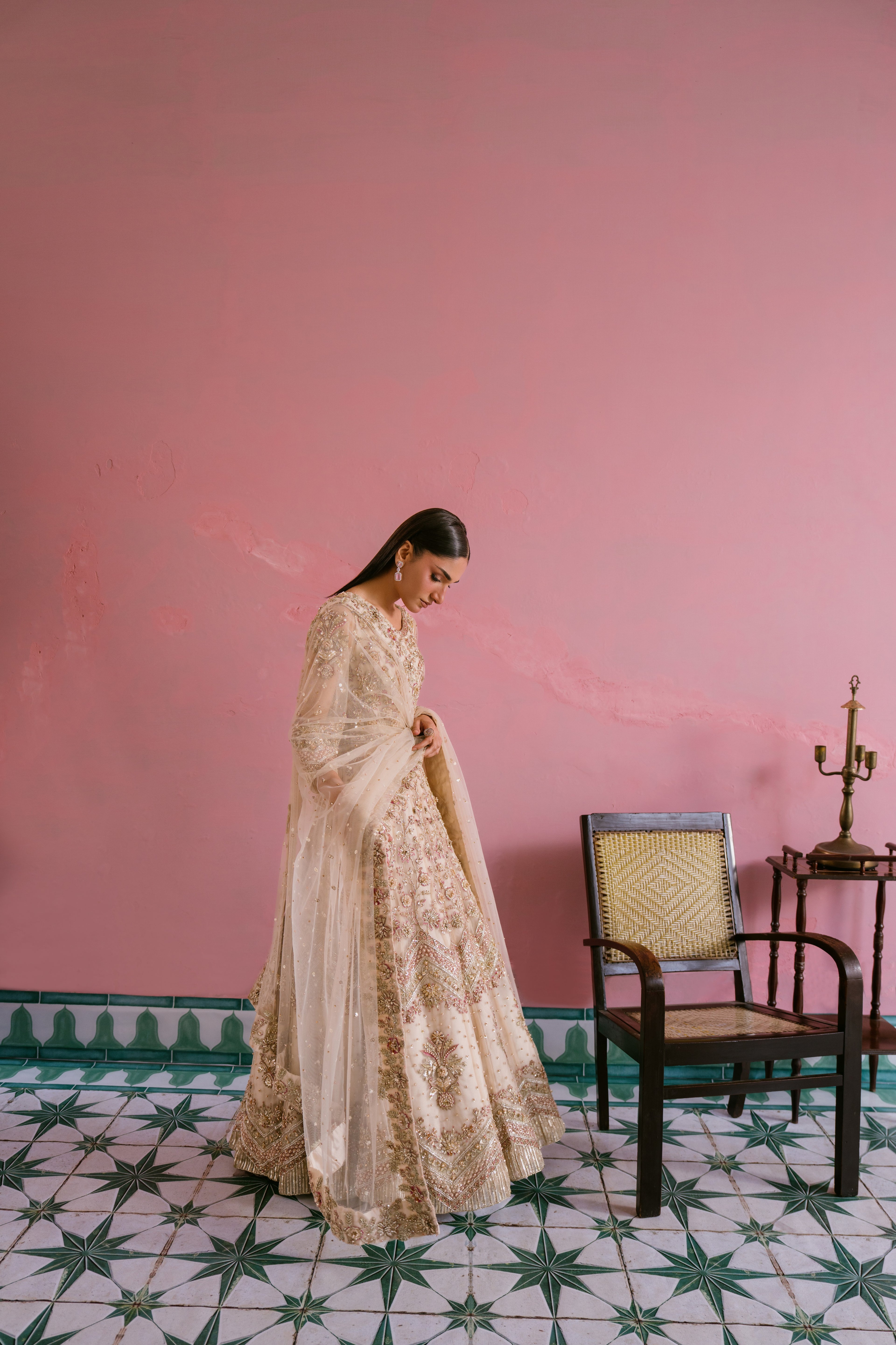 Saaz soft gold net dress with hand embellishment