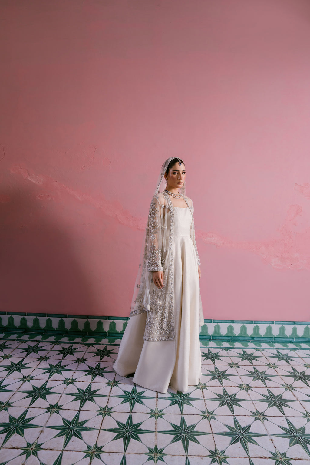 Seher ivory shimmer silk pishwas with embellished net gown