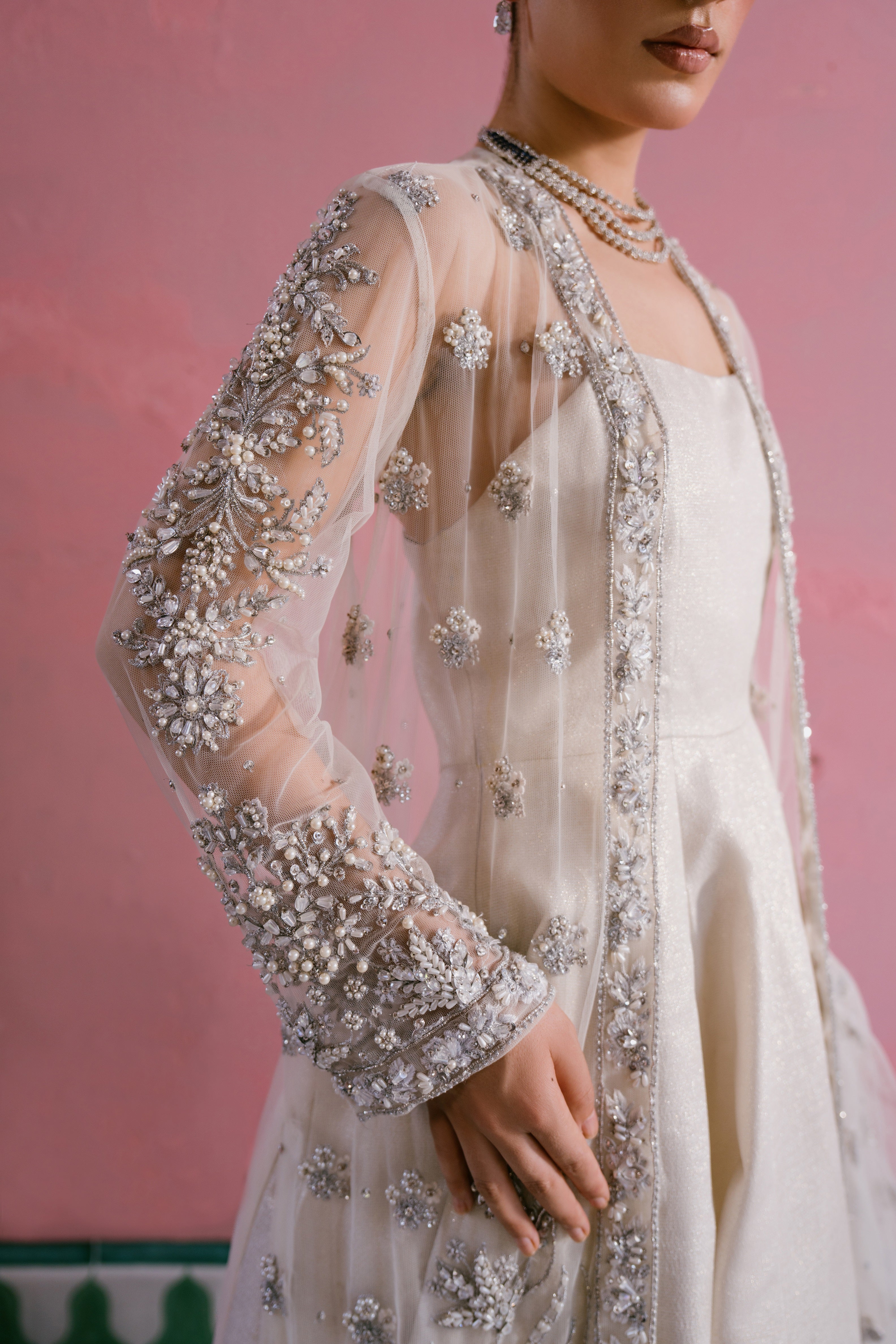 Seher ivory shimmer silk pishwas with embellished net gown