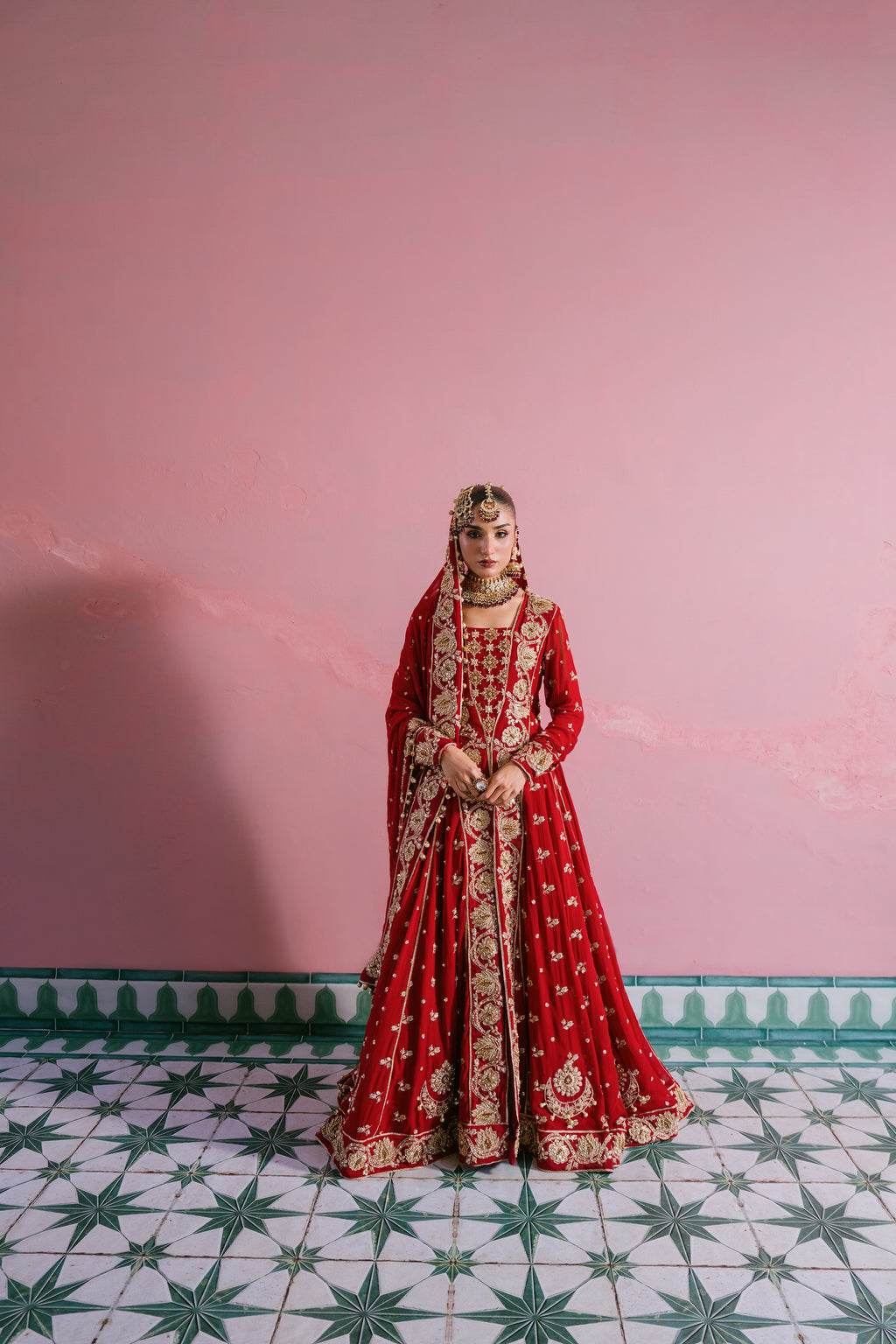 Laal red chiffon bridal dress with hand embellishment and 10 meter flare