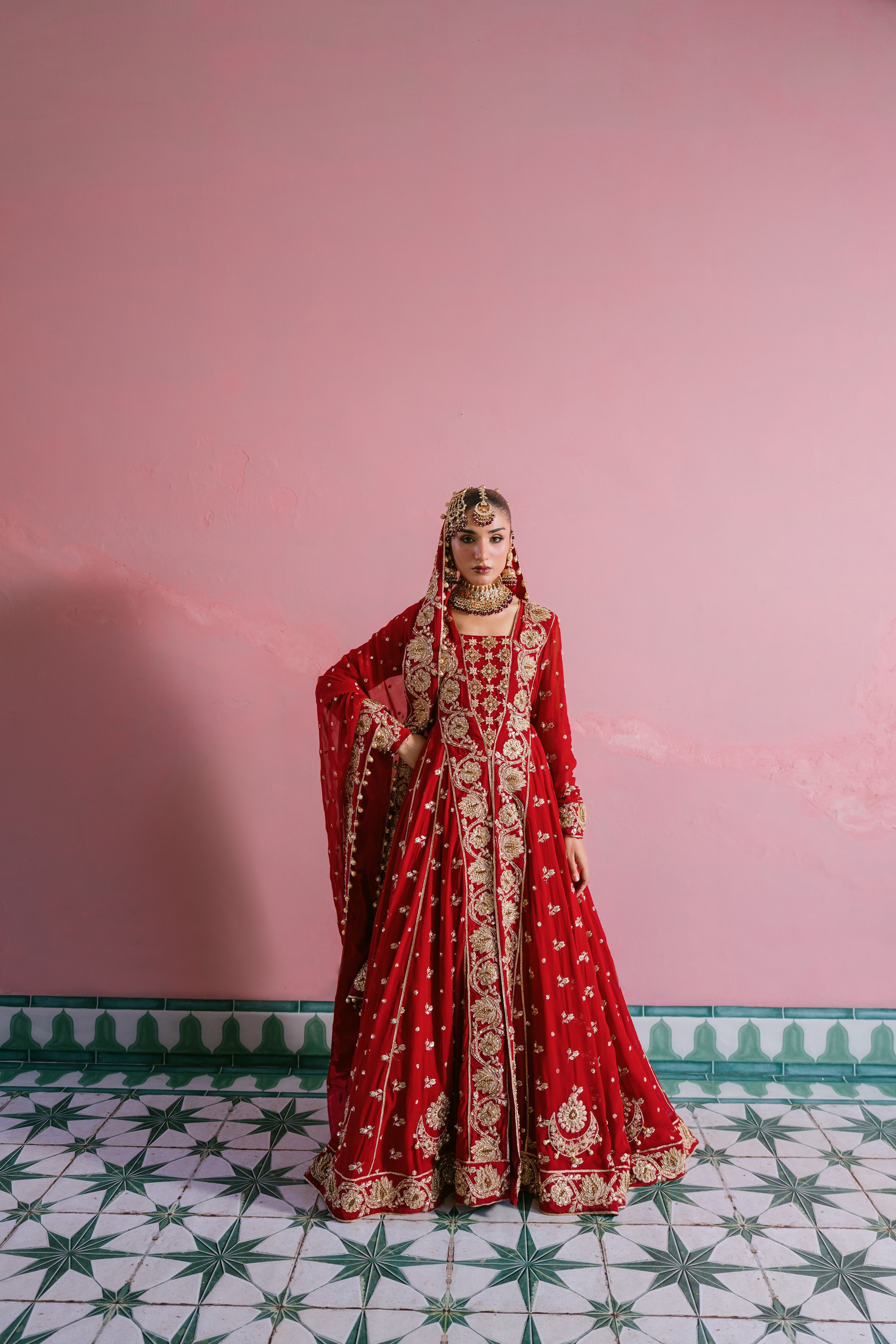 Laal red chiffon bridal dress with hand embellishment and 10 meter flare