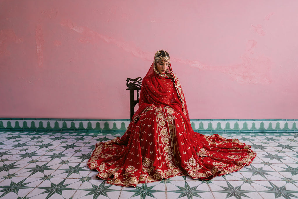 Laal red chiffon bridal dress with hand embellishment and 10 meter flare
