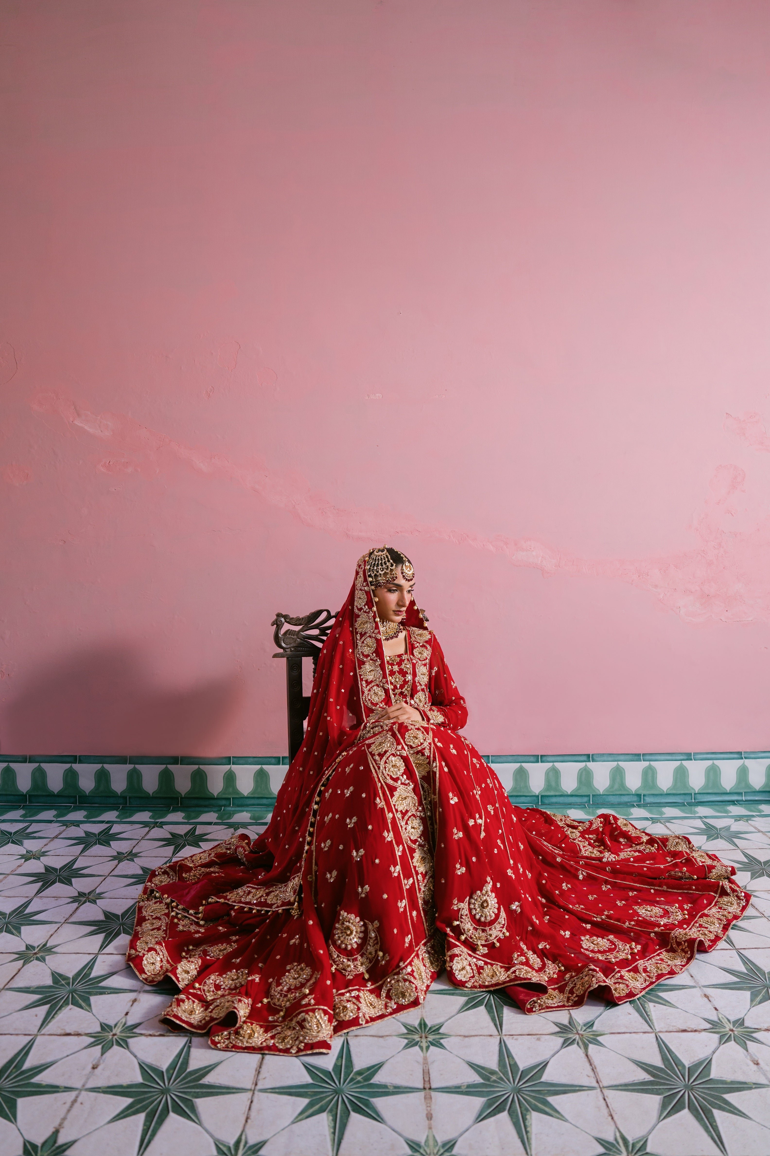 Laal red chiffon bridal dress with hand embellishment and 10 meter flare