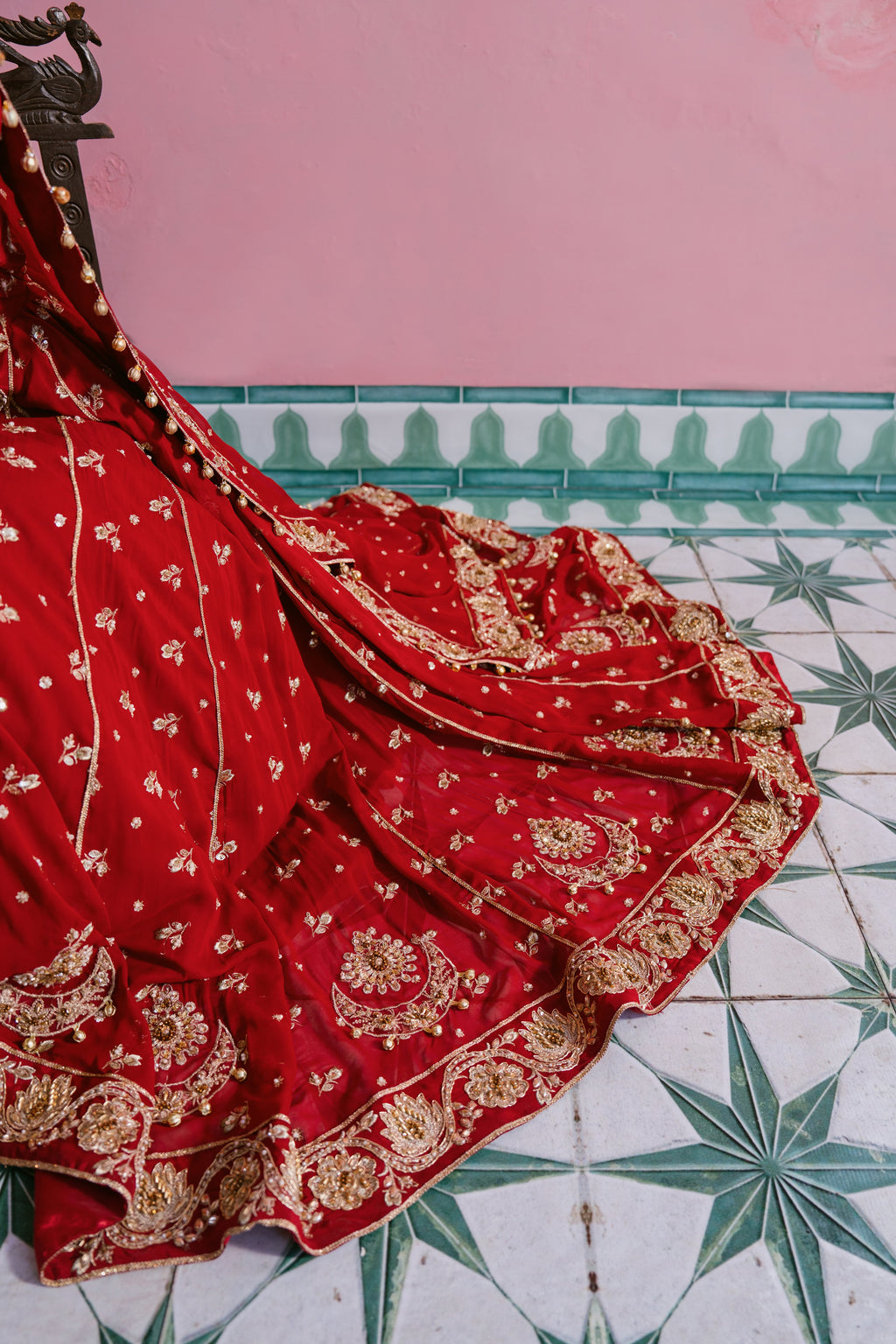 Laal red chiffon bridal dress with hand embellishment and 10 meter flare