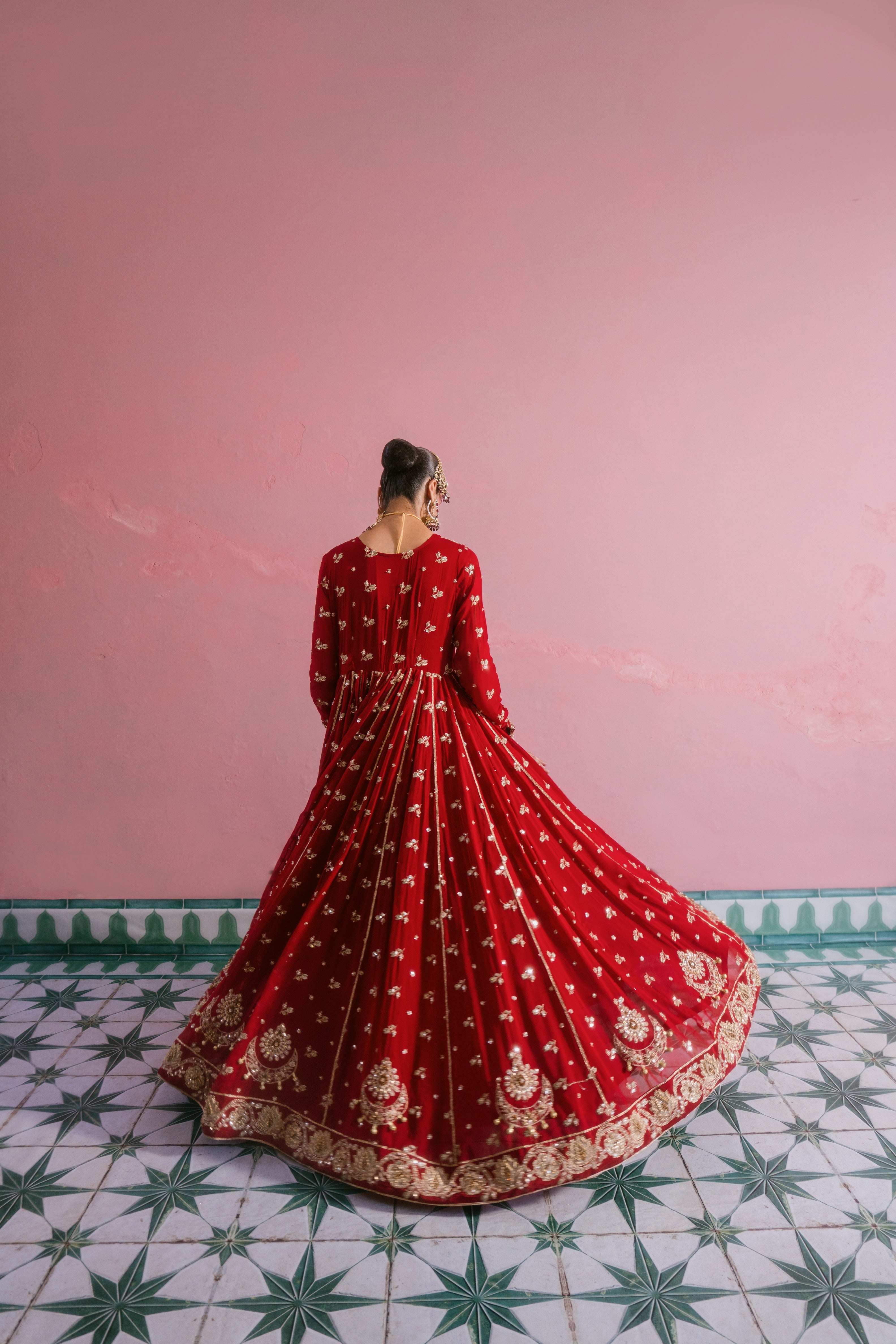 Laal red chiffon bridal dress with hand embellishment and 10 meter flare