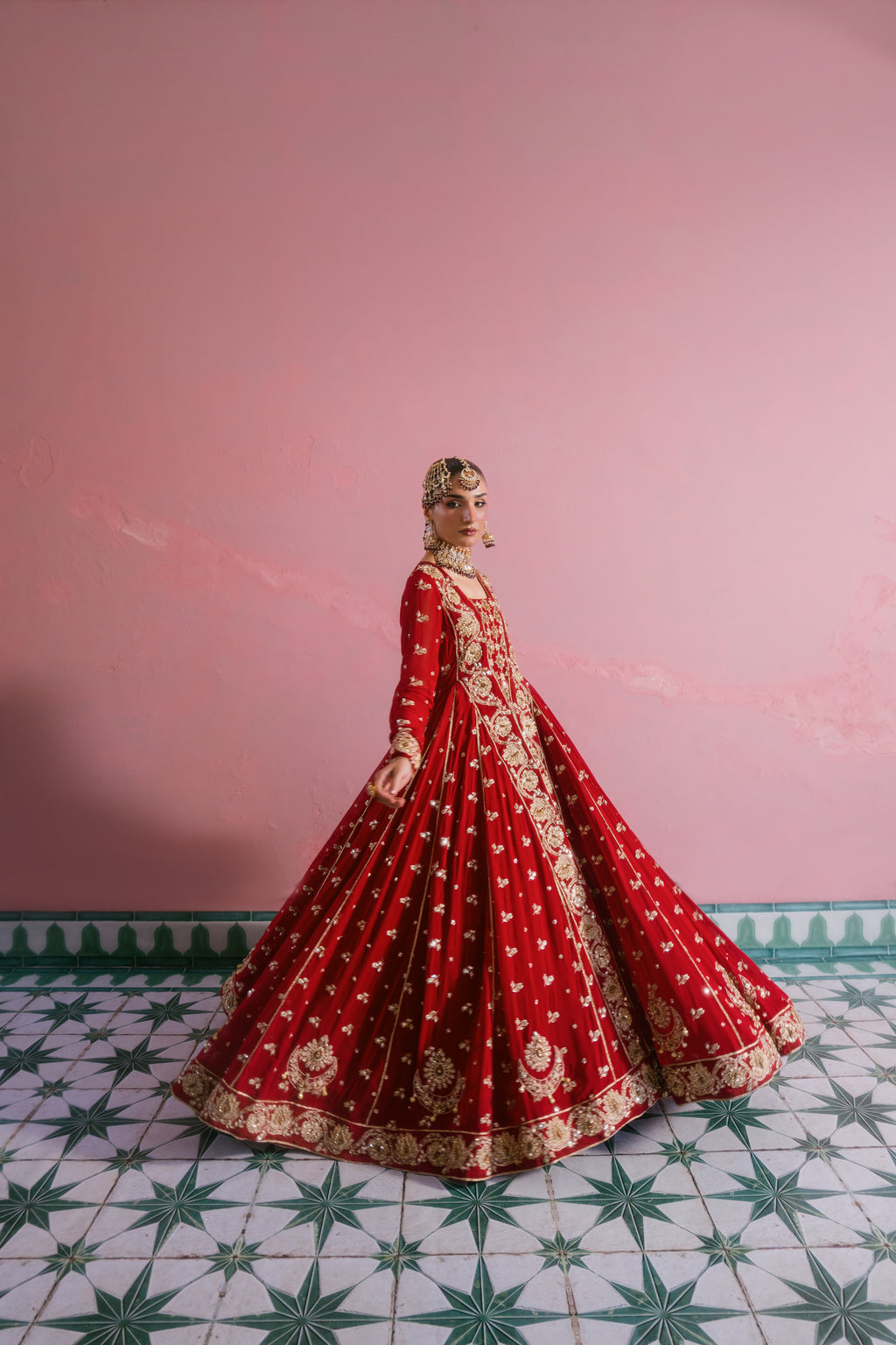 Laal red chiffon bridal dress with hand embellishment and 10 meter flare