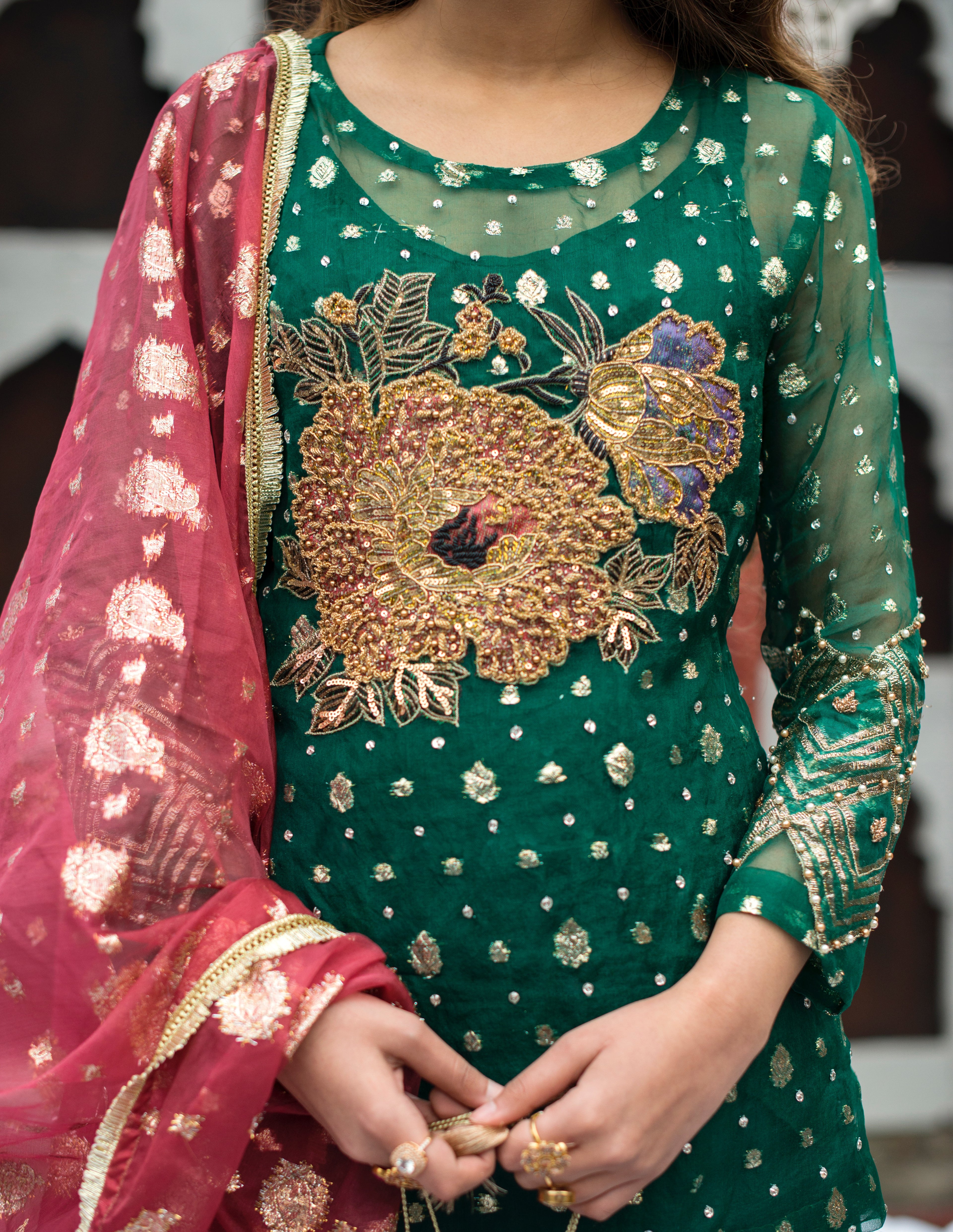 Sabz green flared ghrara with hand embellished organza shirt and dupatta