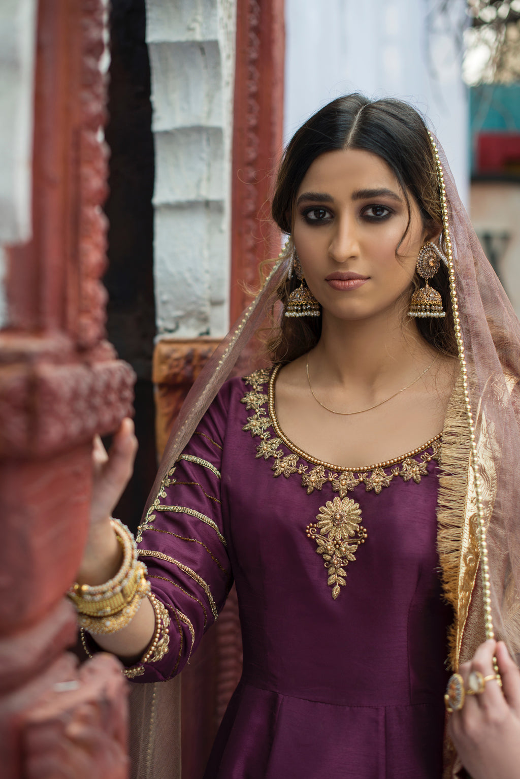 Jaamni medium tone flared pishwas with hand embellished neckline and tissue shawl